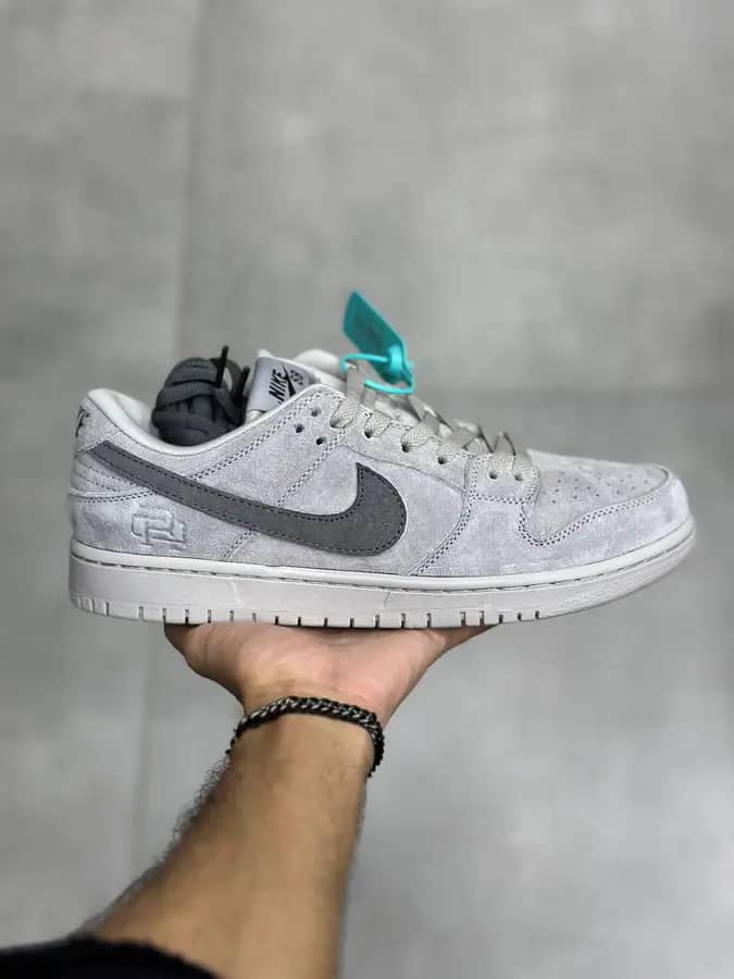 نایک اس بی دانک بدون ساق ریگنینگ چمپ Nike Sb Dunk Low Reigning Champ