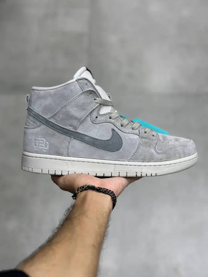نایک اس بی دانک ساقدار ریگنینگ چمپ Nike Sb Dunk High Reigning Champ